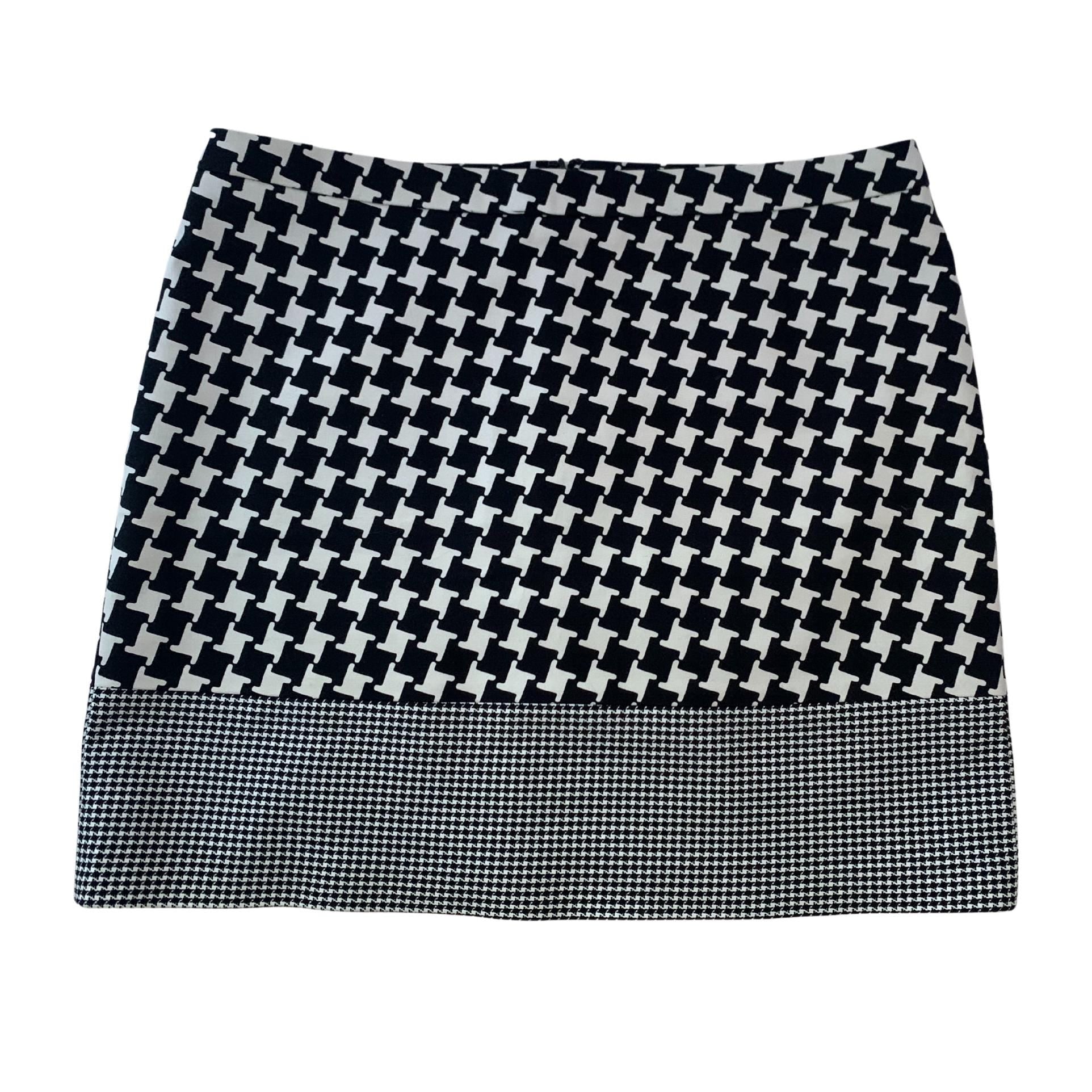 Black and white Reiss miniskirt, classic pattern, 16-inch length