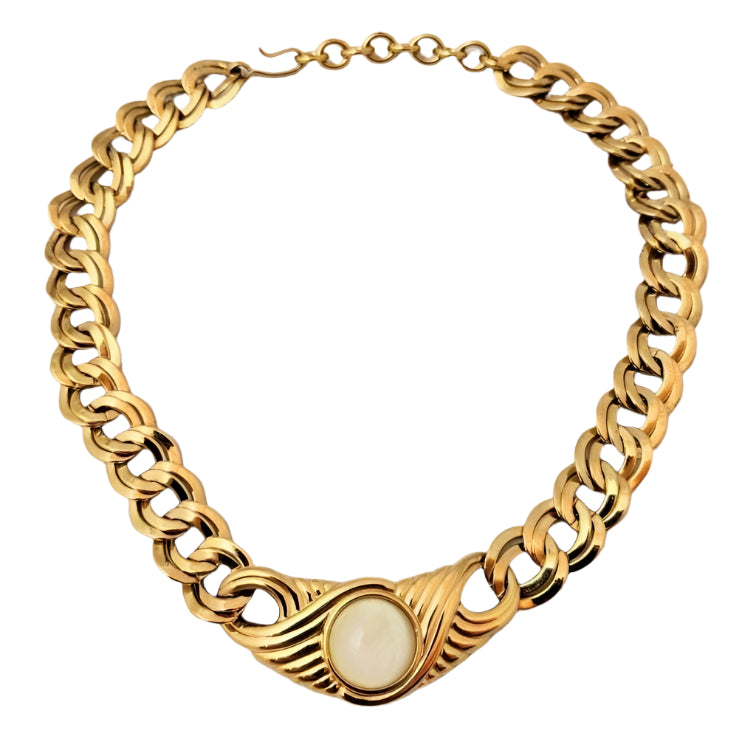 Discover this vintage Monet gold choker necklace from the 1970s, featuring a double-link chain and cream centerpiece. Signed, 44cm, excellent condition
