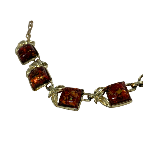 Close-up of 1950s Coro square Lucite links and gold waves