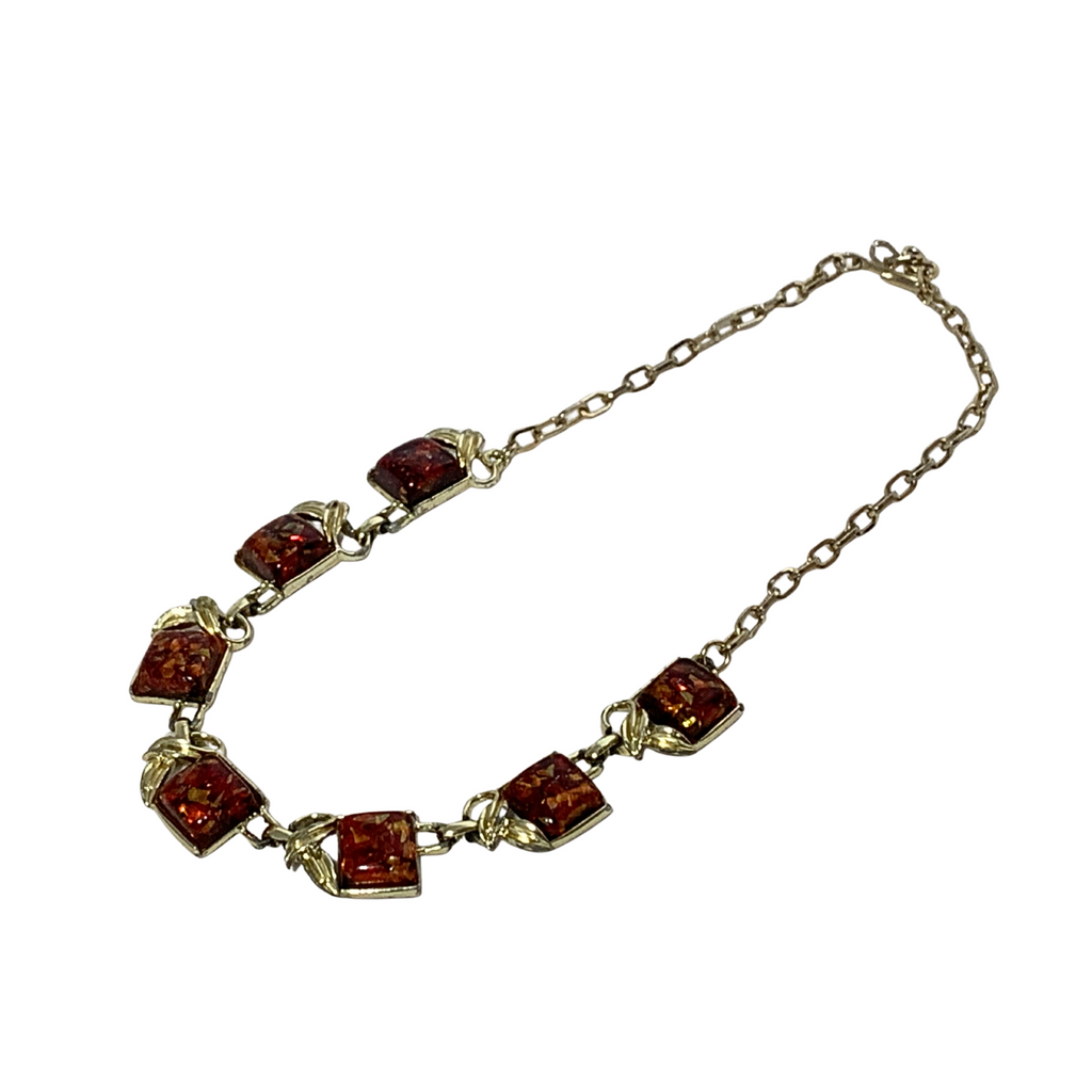 Retro gold-tone Lucite necklace with confetti sparkle