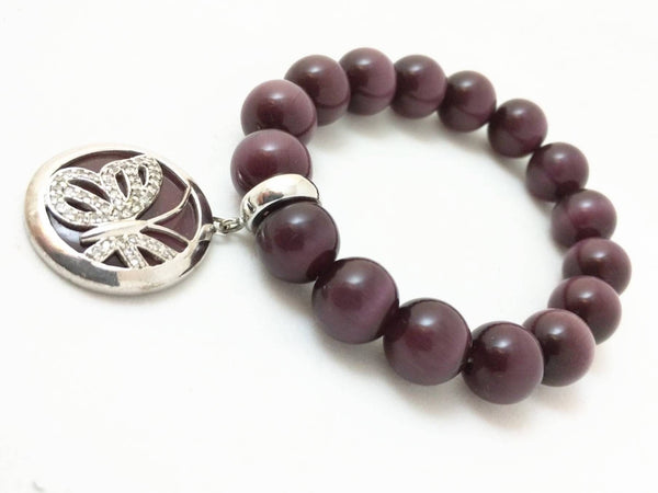 Purple tiger eye beaded bracelet with sterling silver butterfly charm, elastic fit