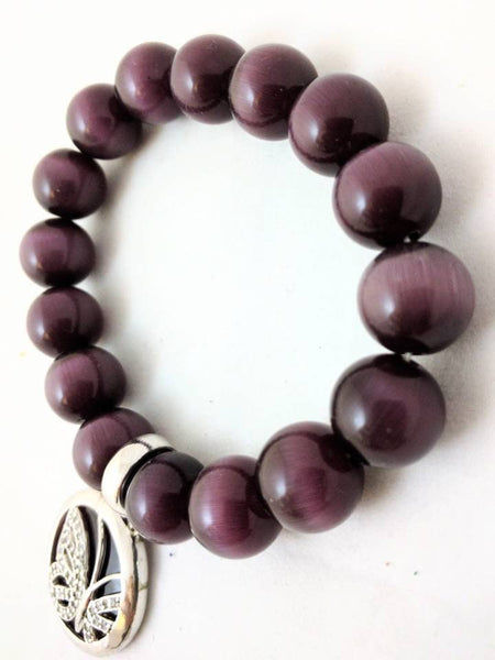 Purple tiger eye beaded bracelet with sterling silver butterfly charm, elastic fit