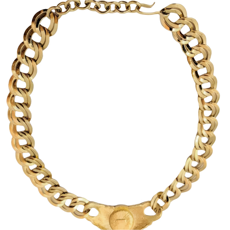 Elegant vintage Monet choker, gold-tone metal, iconic fashion jewelry