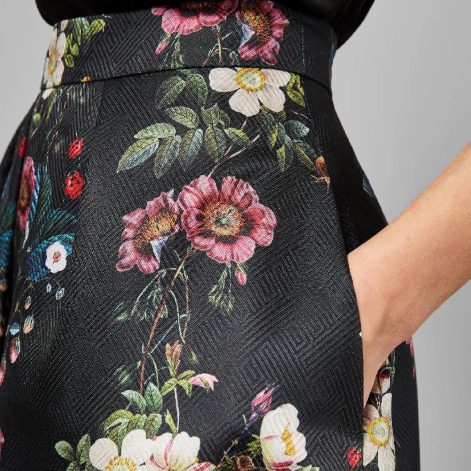 Buy luxury Ted Baker floral midi skirt, structured pleats, high-rise waist, pre-loved fashion