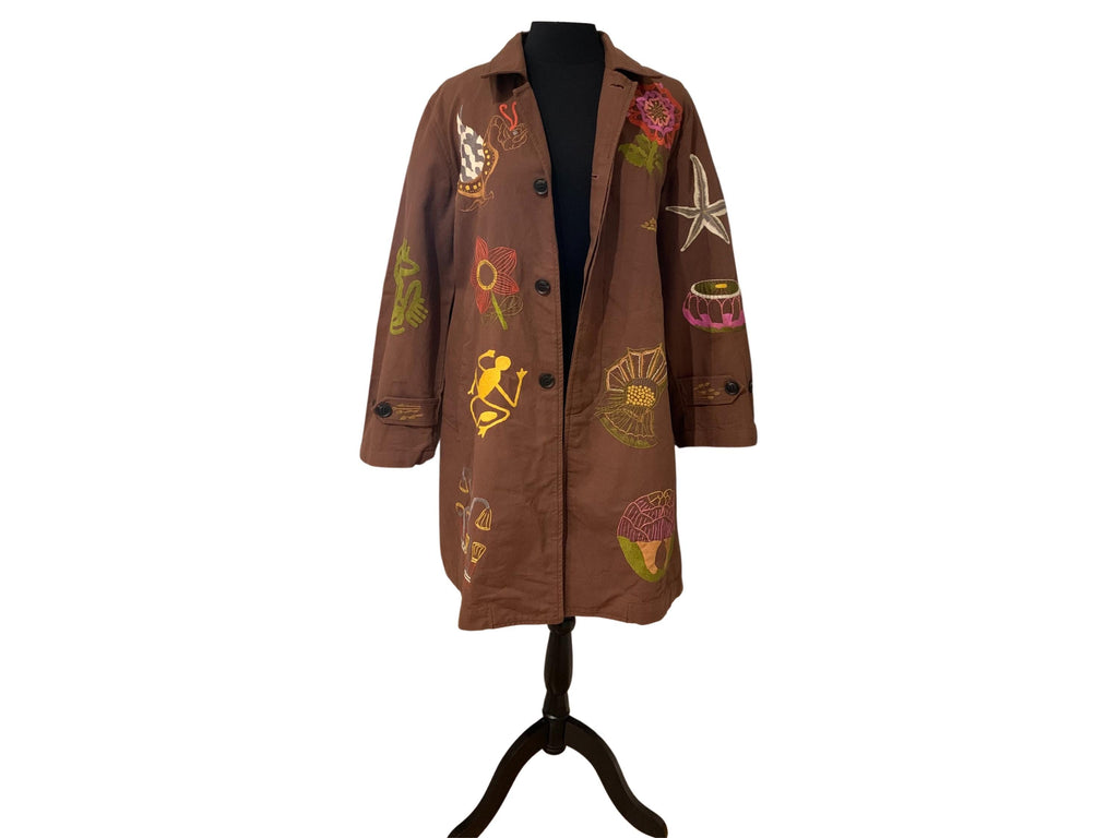 Artistic floral embroidered coat, refined eclectic style, structured yet playful silhouette