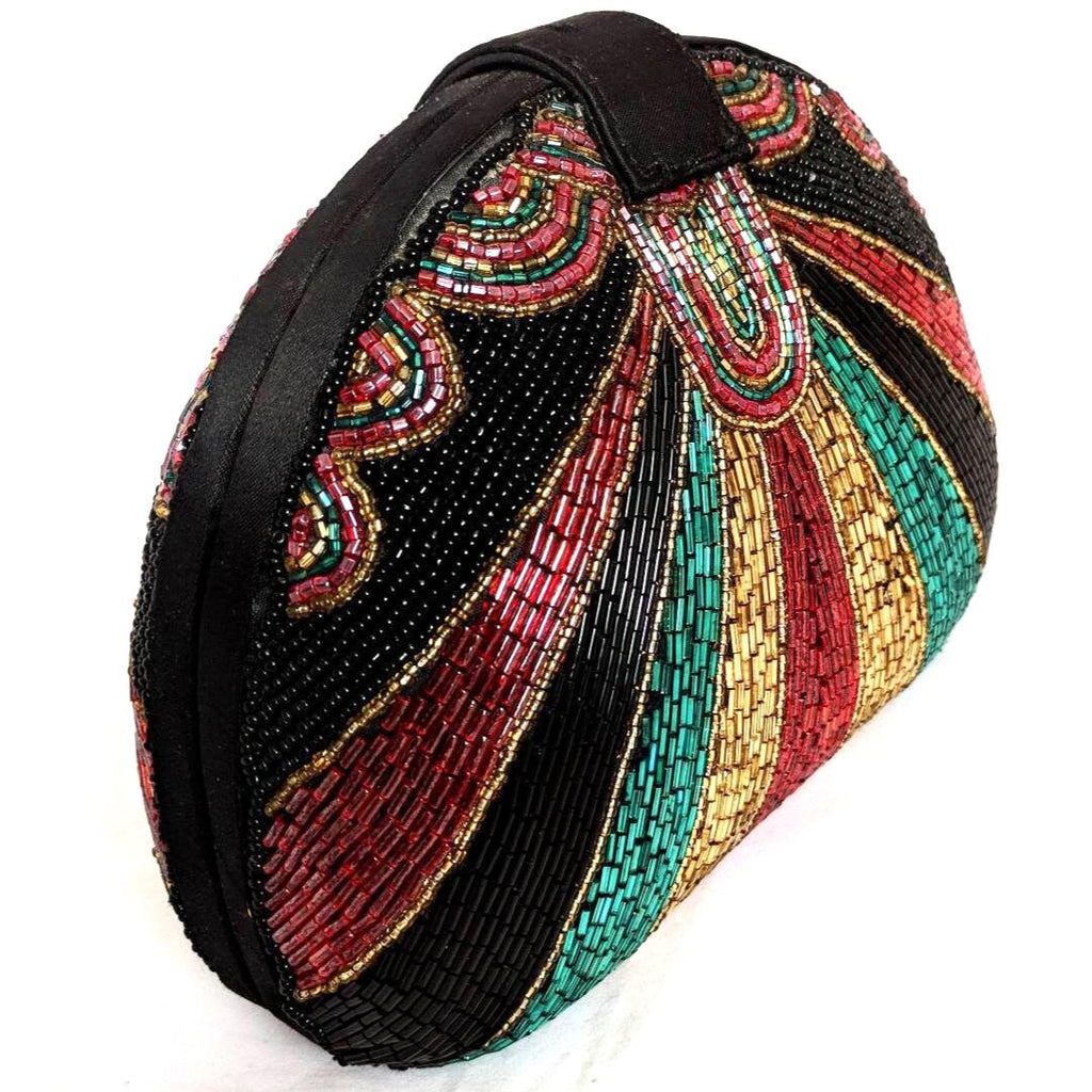 Beaded evening bag with satin interior, twist-top closure, and intricate design