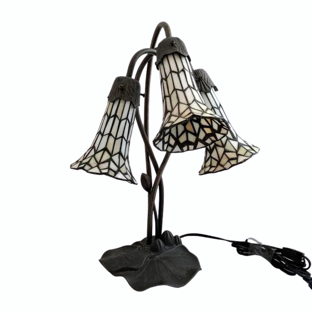 Tiffany-style pond lily table lamp with trumpet-shaped art glass shades, mahogany bronze base