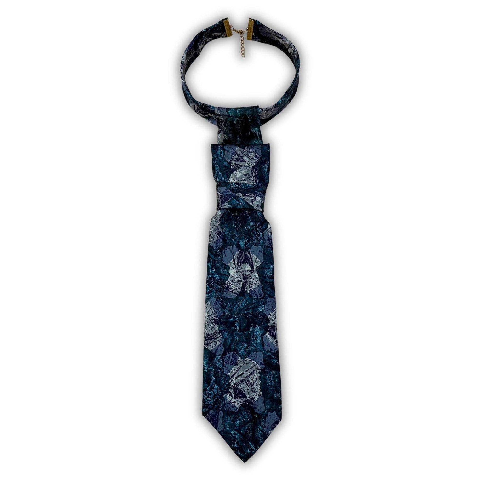 A repurposed teal and charcoal abstract Lanvin silk tie reworked into a women's continental crossover tie.