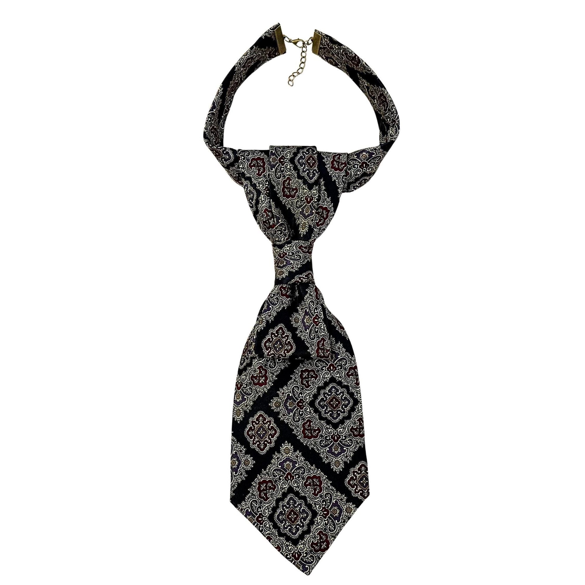 A repurposed black, gray and burgundy Christian Dior silk tie reworked into a women's continental crossover tie with an adjustable chain.