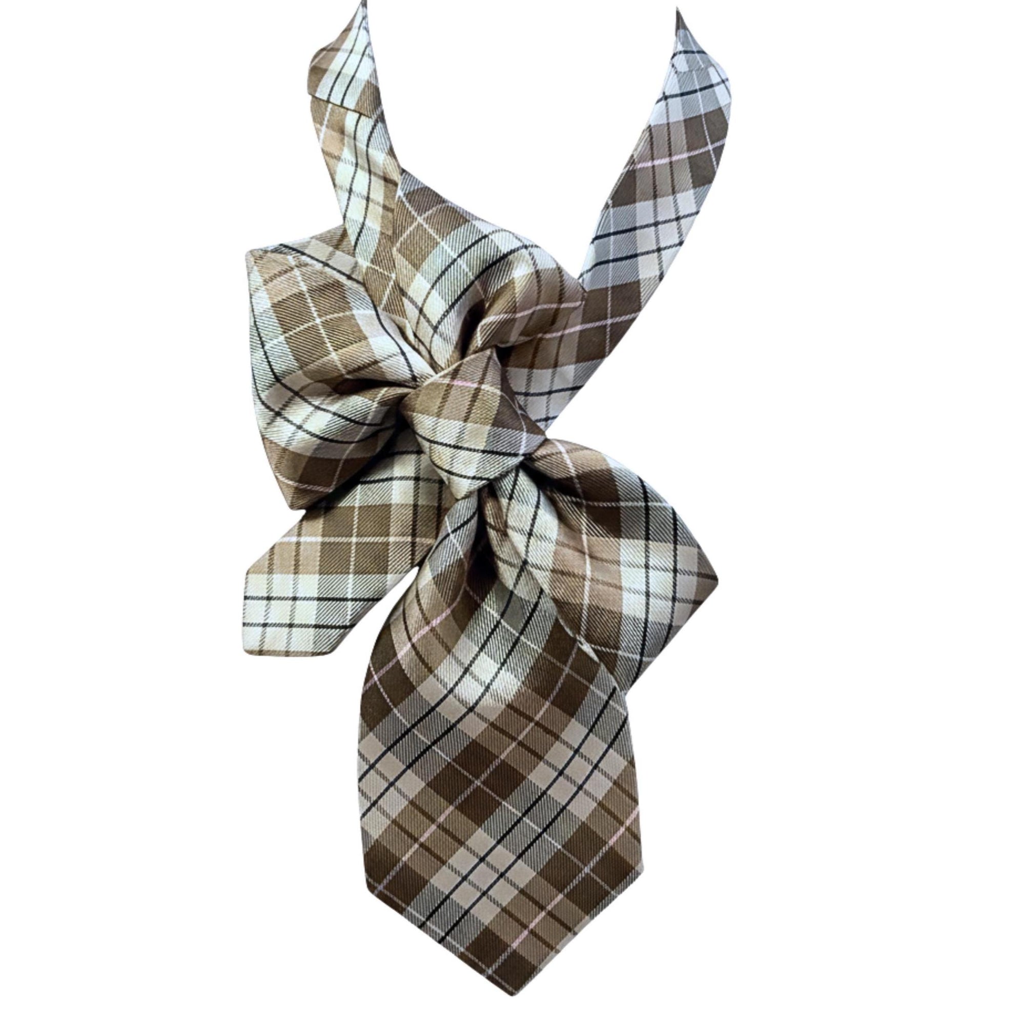 A repurposed brown and cream plaid Andrew Zadi Milano silk tie reworked into a voluminous women's bow style with an adjustable bronze chain.
