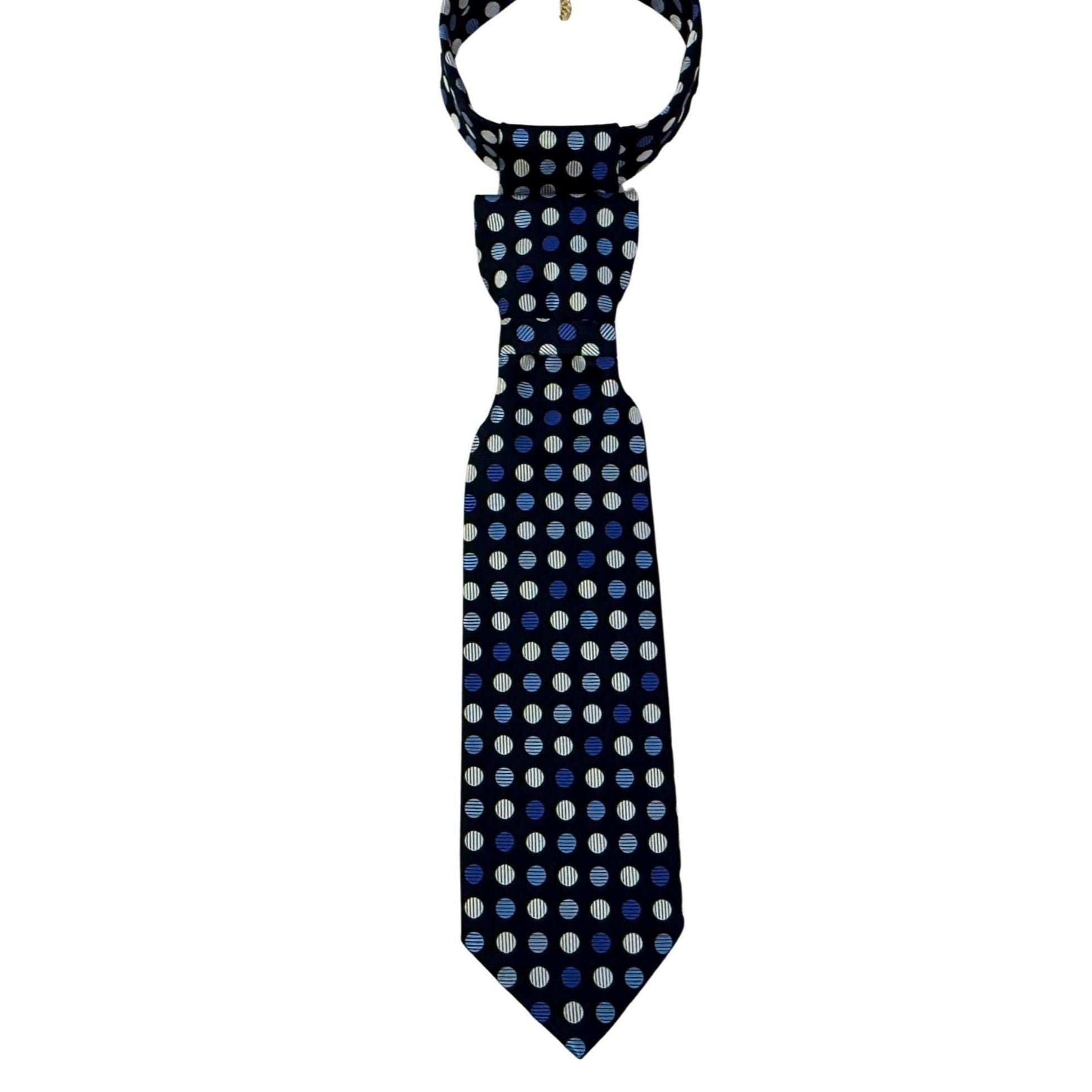 A repurposed navy blue Hilditch & Key silk tie with multi-coloured polka dots reworked into a women's continental crossover tie with a gold-tone chain.