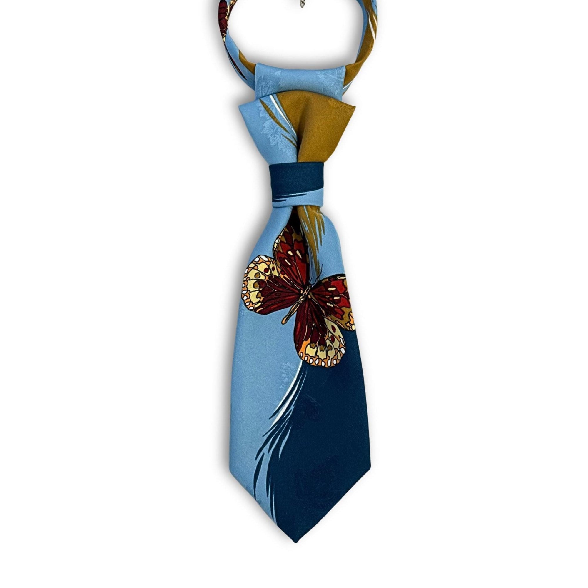A repurposed azure blue Rene de Deauville Paris tie featuring a large butterfly print, reworked into a women's continental crossover tie.