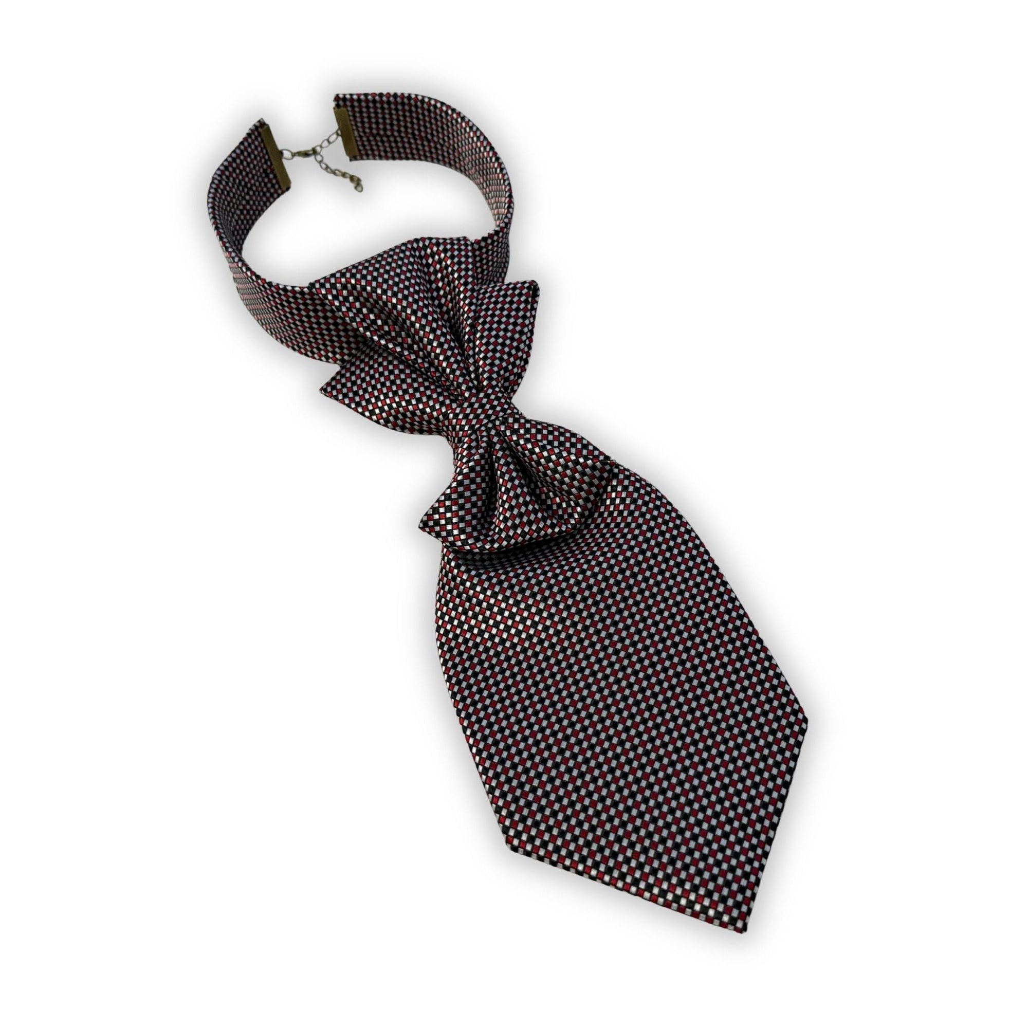 Detailed shot of the hidden dark gray polka dot silk lining on a reworked Boss Hugo Boss tie, showcasing the high-end Italian craftsmanship.