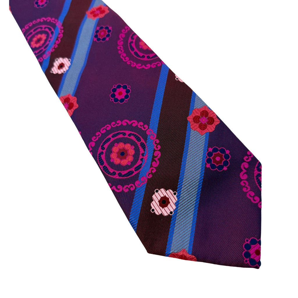 Authentic Paul Smith Italy silk tie. Features a bold 10cm blade and a modernist magenta kaleidoscope pattern. Premium Mulberry silk for the creative, self-assured professional.
