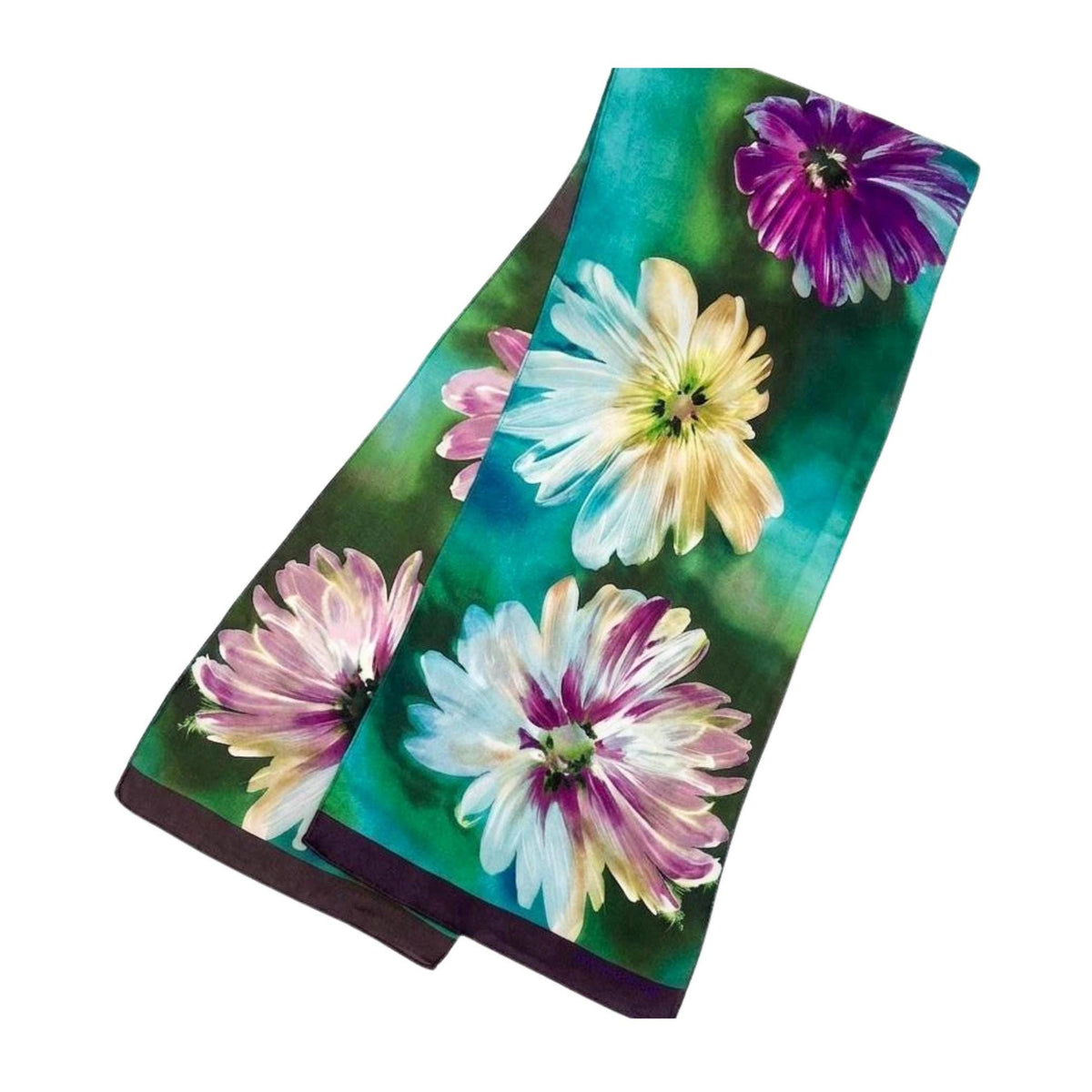 This Harvé Benard silk scarf is a striking example of botanical impressionism. The design features large-scale, painterly floral blooms that appear to float across a deep emerald and teal gradient, creating a lush, forest-like depth.