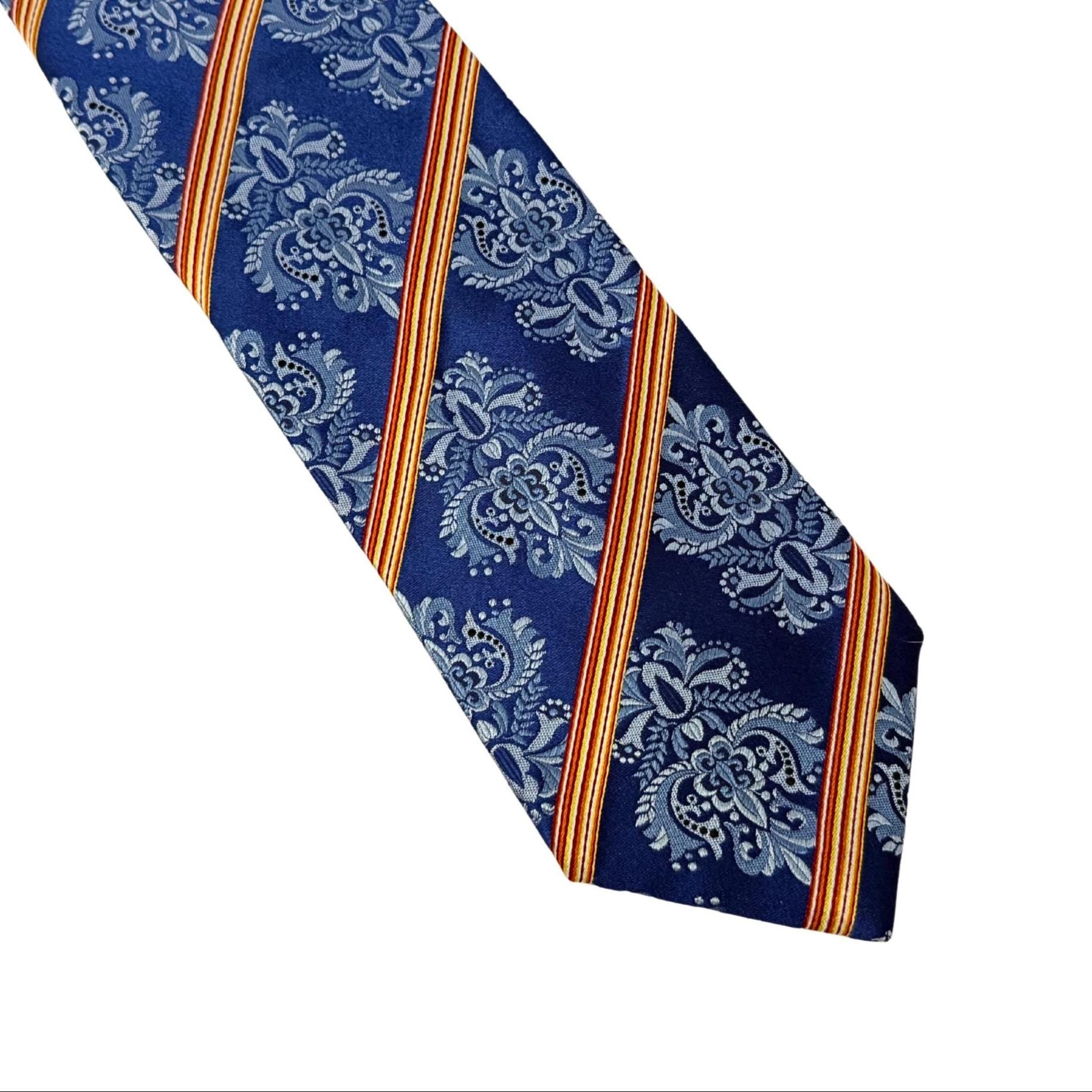 Authentic Paul Smith Italy silk tie. Features a 9.5cm blade in a cobalt damask and stripe pattern. Premium Mulberry silk for the self-made, style-conscious professional.