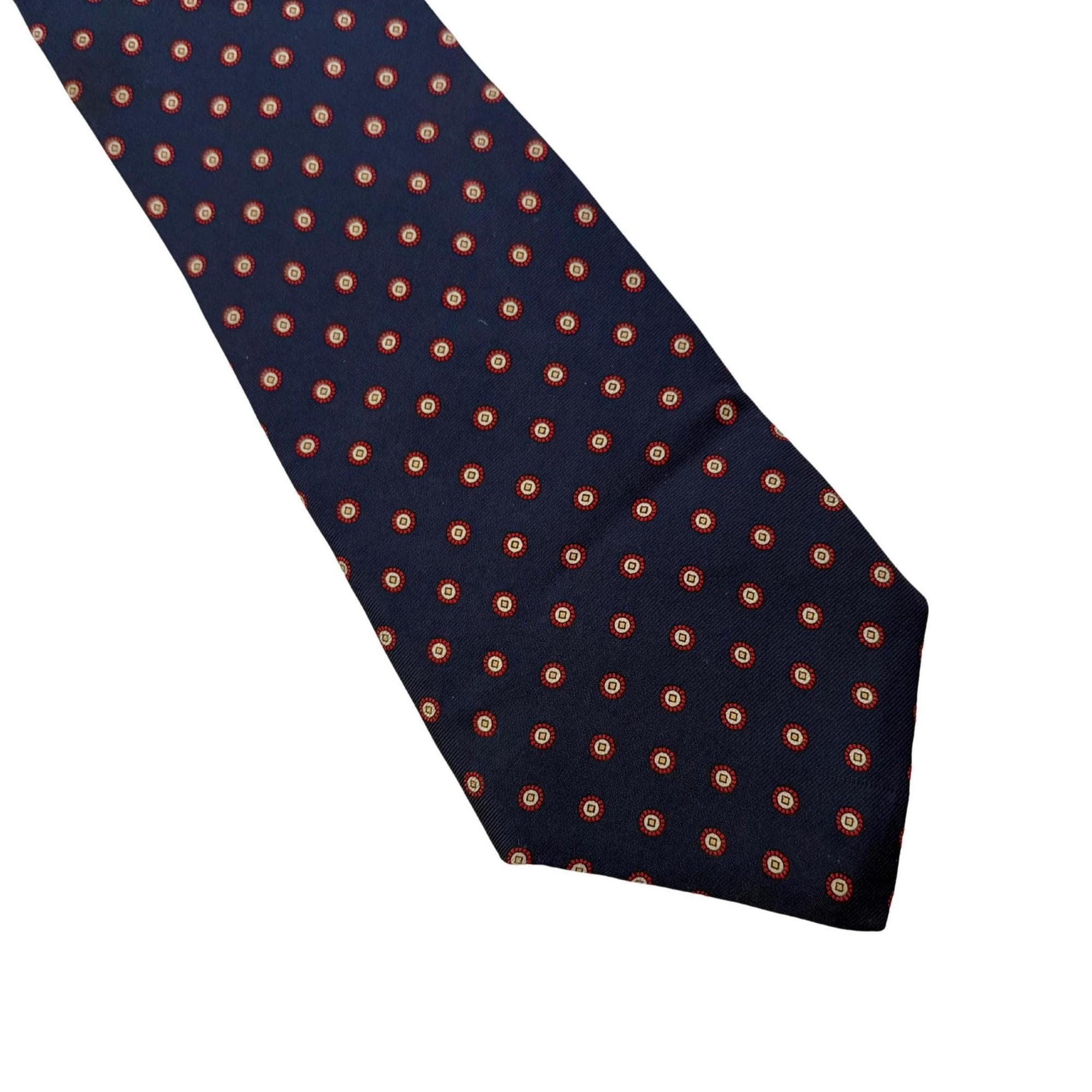 This Yves Saint Laurent tie is a masterclass in classic Parisian tailoring, offering a disciplined pattern that anchors any professional look with quiet authority.