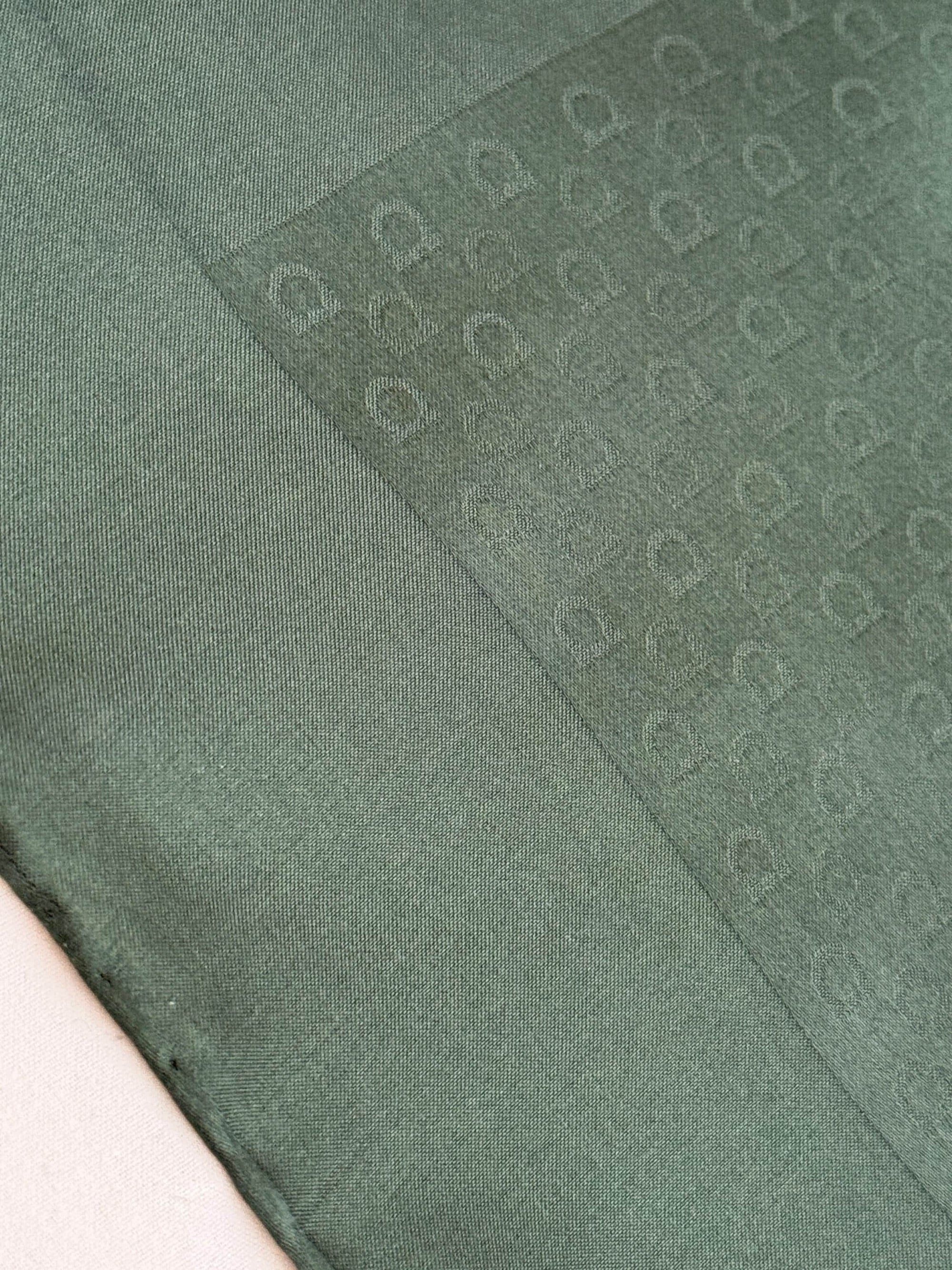 Shop Salvatore Ferragamo silk pocket square in hunter green and white print. New, 41 cm hand-rolled edges. Made in Italy. Luxury men’s gift.