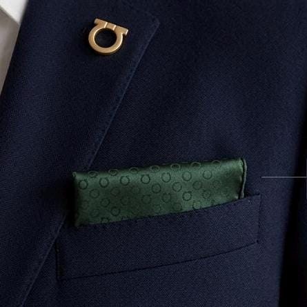 New and never worn, this pocket square is both a collector’s piece and a versatile accessory for modern elegance. The rich green color pairs beautifully with navy, charcoal, and black suits, gray, taupe, white, cream —perfect for boardroom confidence, weddings, or evening events