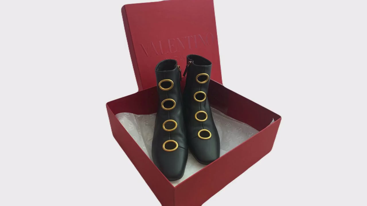 Valentino booties Leather black Valentino ankle booties with golden eyelets